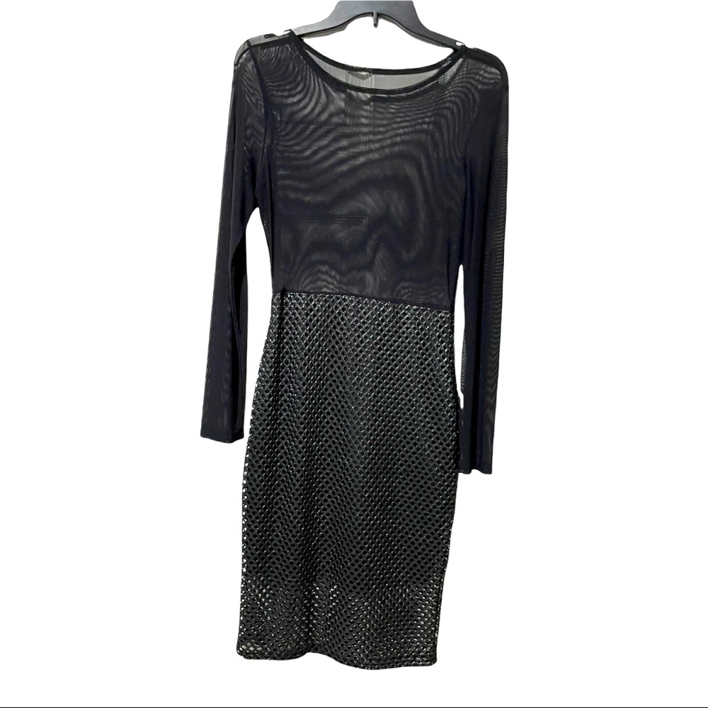 Little Black Dress. Chain Mail Bottom and Sheer Top.